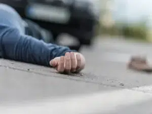 Traffic accident.Young man hit by a car